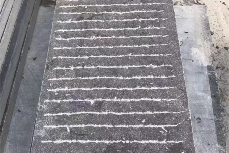 手錾青石闆